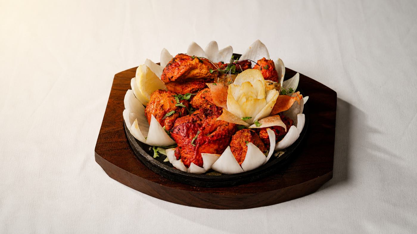 Tandoori chicken platter grilled in the clay oven at Turmeric Benidorm